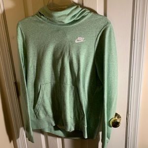 Green woman’s Nike hoodie